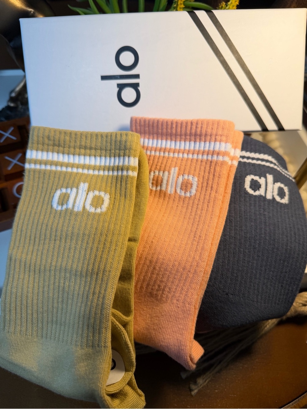ALO Yoga Men's Crew Socks in Olive Green, Peach, and Navy
